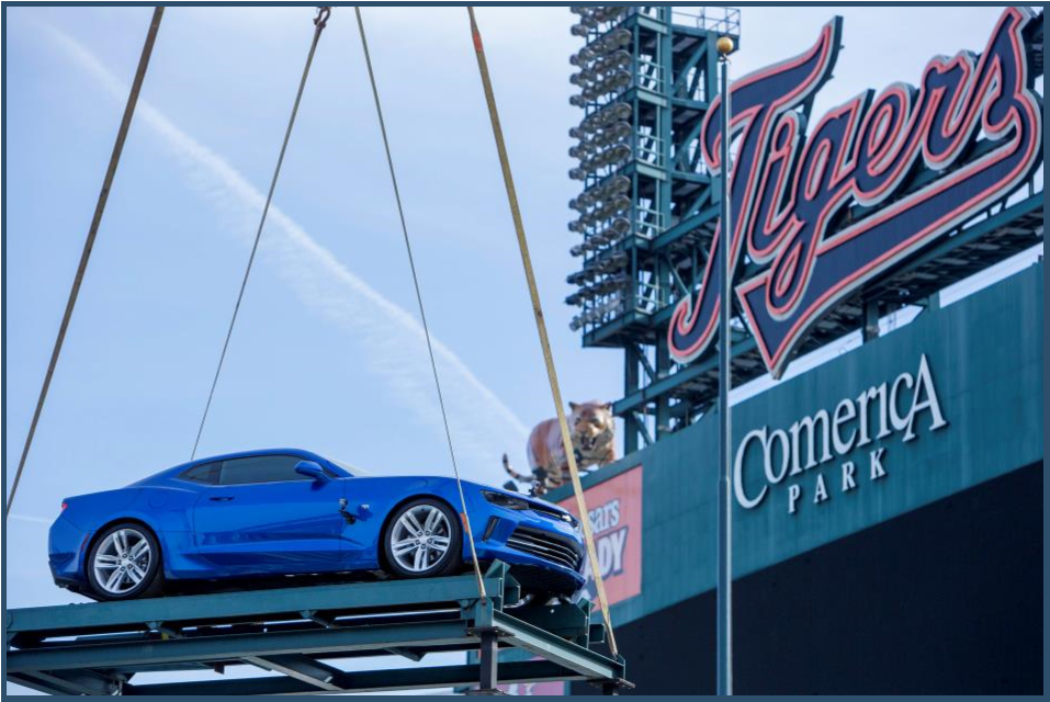 A Hyper Blue Metallic Chevrolet Camaro SS is loaded by crane onto the top of the Chevrolet Fountain inside Comerica Park, home of the Detroit Tigers, in time for the start of the baseball season Wednesday, March 30, 2016. The Tigers' home opener is Friday, April 8 against the New York Yankees.