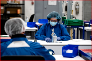 AutoInformed.com on GM Canada Workers assemble masks using ultrasonic welding stations 